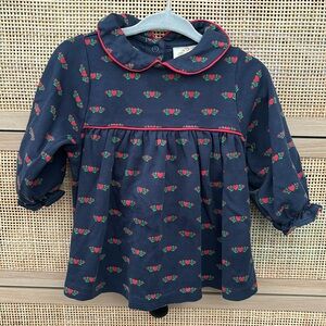 Beaufort Bonnet navy shirt with heart detail and ruffles at the arm openings